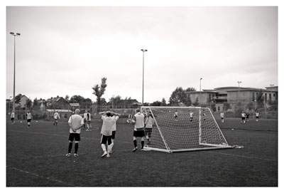 Tournament kicks off - black and white photo from behind the goal