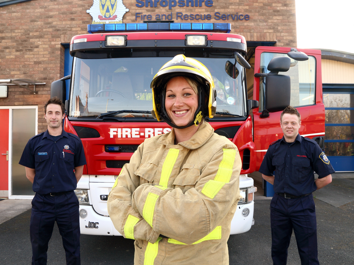 Firefighter Kat Frost (centre)with colleagues Martin Smith and Dan Jackson (right)