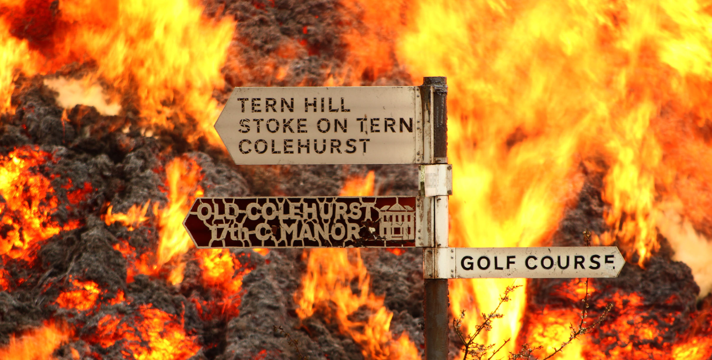 The fierce fire fought by firefighters even melted road signs