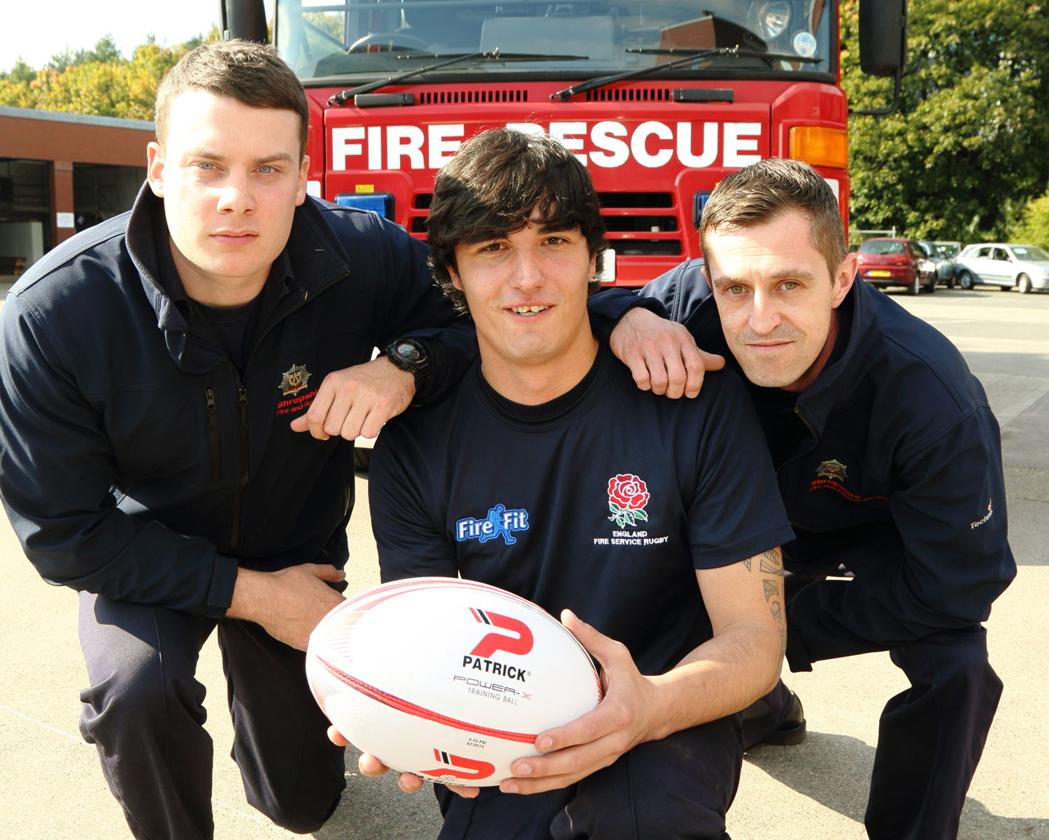 Firefighter colleagues Chris Bayliss, (left) from Ludlow, and Matt Barrow, from Baschurch, fire up George Jacks ready for his England rugby match.