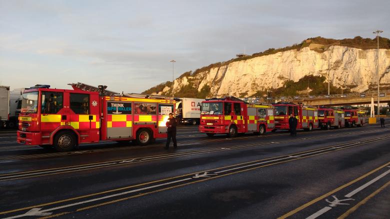 Five fire engines arrive at Dover on their journey from Shropshire to Romania