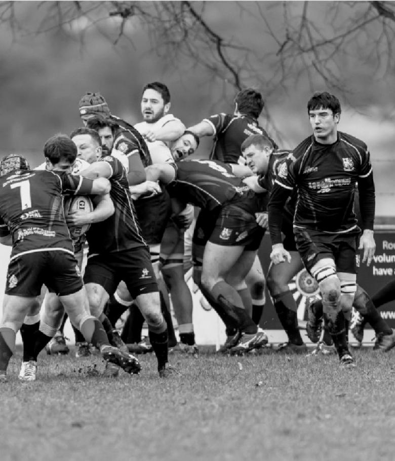 Ludlow firefighter George Jacks (pictured right of rugby scrum) gets ready to win the ball back for the UK Lions fire service team