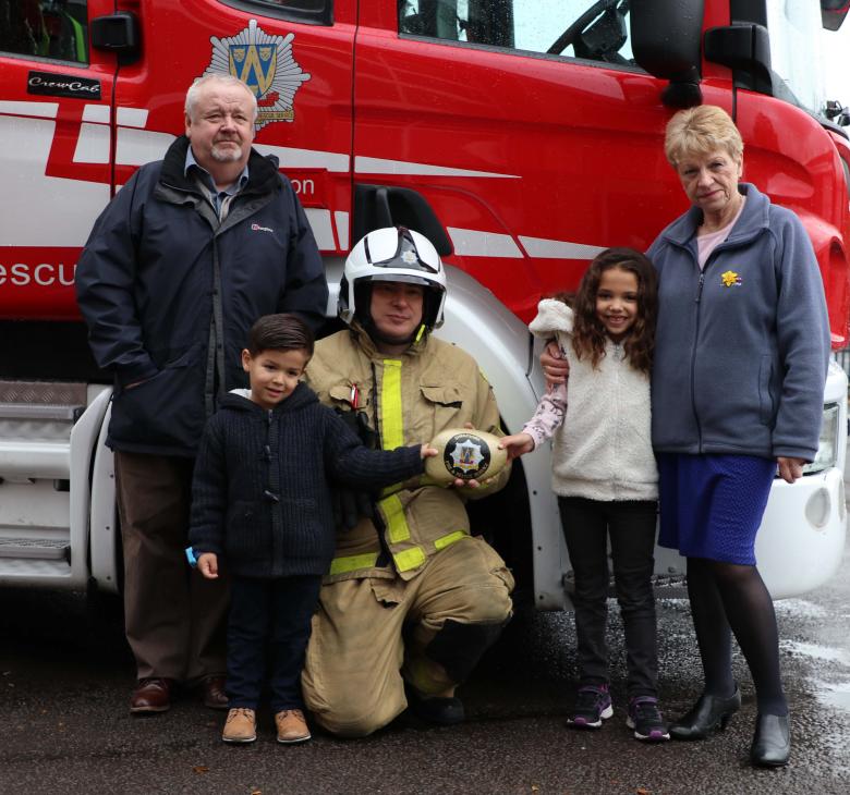 Sophia and Saul Moody at Market Drayton Fire Station with Watch Manager Mark Smith and grandparents Dale and Lin Moody 